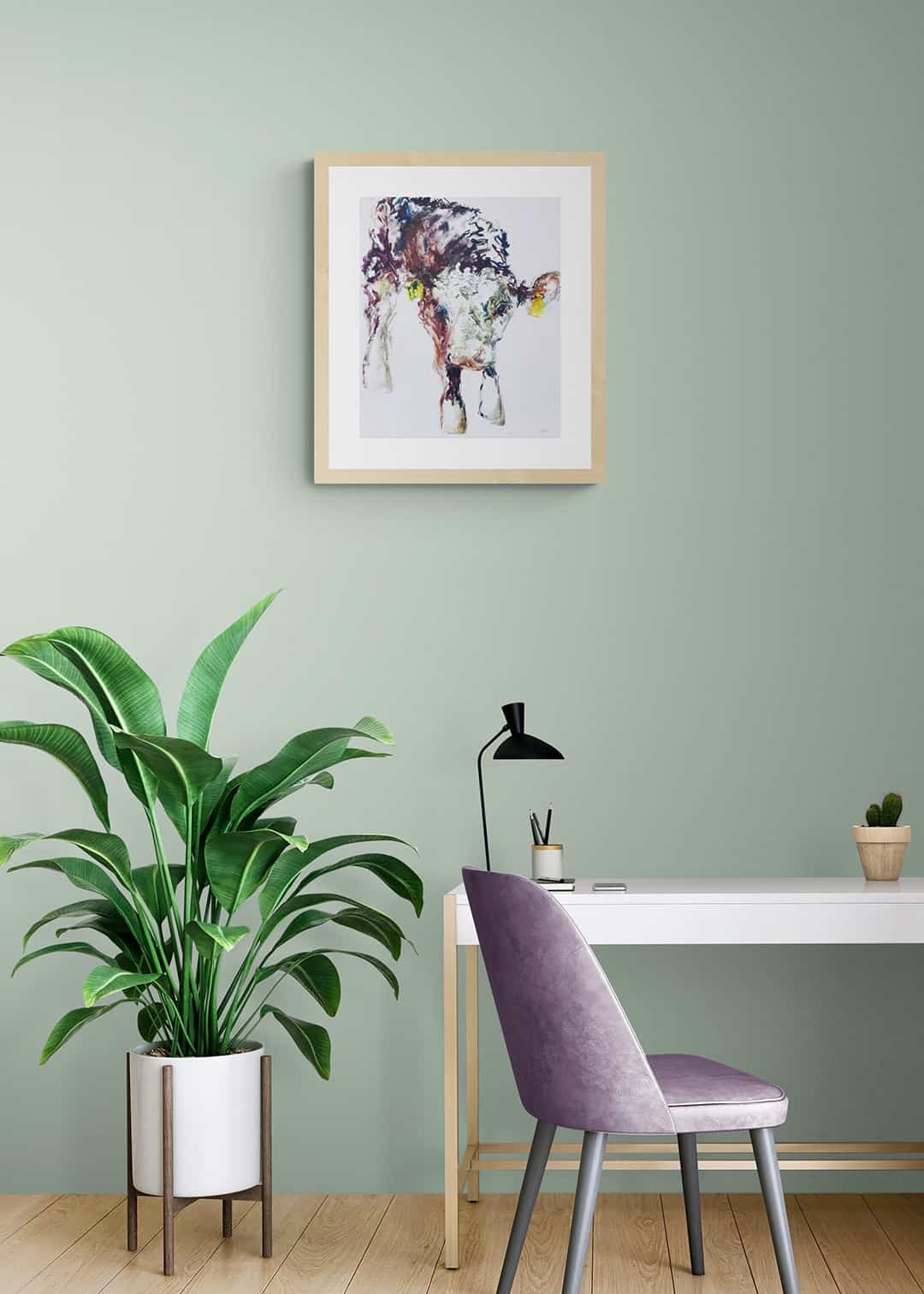 Young Whitehead hanging in bright office with plant -- Una O Grady Paintings